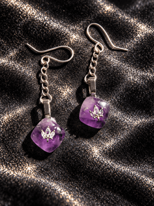 Boucles d’oreille amethyste etoilé .